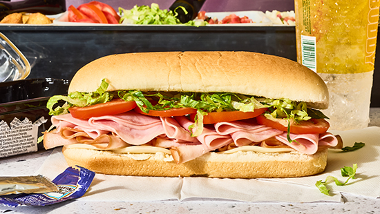 Bread Ready Ham and Turkey sub sandwich with lettuce and tomato