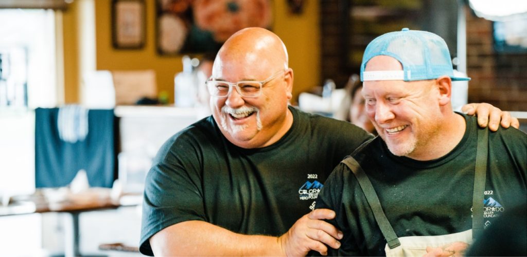 Bob and a coworker smiling