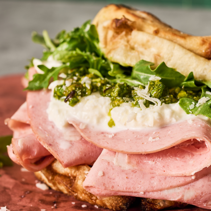 a mortadella panuozzo on a tray