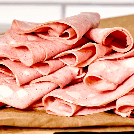 Sliced mortadella on a tray