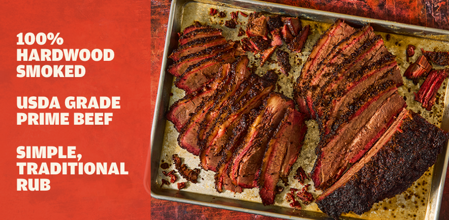 Metal tray with sliced Austin Blues Texas Prime brisket that reads "100% hardwood smoked. USDA Grade Prime Beef. Simple, Traditional Rub"